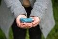 Young woman holding an astma inhaler against attacks in her hands, healthcare concept Royalty Free Stock Photo