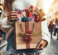 young woman holding a bag full of gifts and gadget in a crowded street