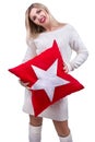 Young woman holding a beautiful pillow.Cushion for interior decoration.