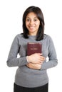 Young woman holding a bible showing commitment