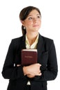 Young woman holding a bible whilst looking up Royalty Free Stock Photo