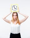 Young woman holding big clock Royalty Free Stock Photo