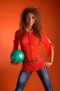 Young woman holding bowling ball Royalty Free Stock Photo