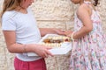 Young Woman Holding A Box With Sweets. Royalty Free Stock Photo