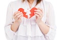Young woman holding broken heart Royalty Free Stock Photo