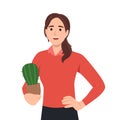 Young woman holding a cactus in her hands. Friendly card, poster or print Royalty Free Stock Photo
