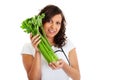 Young woman holding celery Royalty Free Stock Photo