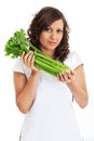 Young woman holding celery Royalty Free Stock Photo