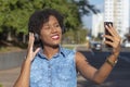 Young woman holding a cellphone to make video call Royalty Free Stock Photo
