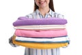 Young woman holding clean towels on white background, closeup Royalty Free Stock Photo