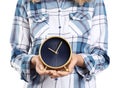 Young woman holding clock on white backgroun Royalty Free Stock Photo