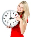 Young woman holding a clock. winter time Royalty Free Stock Photo