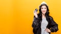 Young woman holding a compact camera Royalty Free Stock Photo