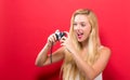 Young woman holding a compact camera Royalty Free Stock Photo