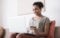 Young woman holding credit card and using laptop computer at home, Businesswoman or entrepreneur working, Online shopping concept Royalty Free Stock Photo