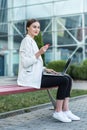 Young woman holding credit card and using laptop computer. Online shopping concept Royalty Free Stock Photo