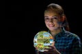 The young woman holding earth with nature photos Royalty Free Stock Photo