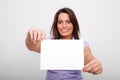 A young woman, holding an empty paper