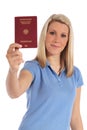 Young woman holding german passport