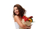 Young woman holding grocery paper shopping bag full of fresh vegetables. Diet healthy eating concept Royalty Free Stock Photo