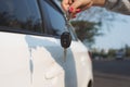 Young woman holding in a hand car keys Royalty Free Stock Photo