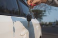 Young woman holding in a hand car keys Royalty Free Stock Photo