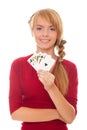 Young woman holding in hand poker card Royal