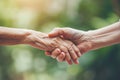 Young woman holding the hand of a senior. Taking care of the elderly concept. Generative AI Royalty Free Stock Photo