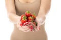 Young Woman Holding a Handful of Strawberries Royalty Free Stock Photo