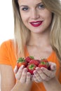 Young Woman Holding a Handful of Strawberries Royalty Free Stock Photo