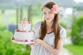 Young woman holding her birthday cake Royalty Free Stock Photo