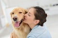 Young woman holding her dog in her arms Royalty Free Stock Photo