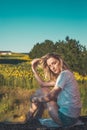 Young woman holding her hair and posing in rural setting Royalty Free Stock Photo