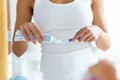 Young woman holding her tooth-brush with toothpaste at home Royalty Free Stock Photo