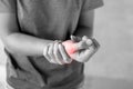 Young woman holding her wrist pain because using computer long time. De Quervain`s tenosynovitis, Intersection Symptom, Carpal Royalty Free Stock Photo