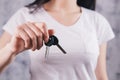 Young woman holding house keys Royalty Free Stock Photo