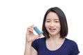 Young woman holding inhaler device Royalty Free Stock Photo