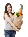 Young Woman Holding Large Bag of Healthly Groceries - Stock Image Royalty Free Stock Photo