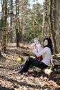 Young woman holding little baby girl Royalty Free Stock Photo