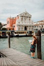 Young woman holding a map in Venice, Italy