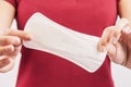 Young woman holding mentrual pad Royalty Free Stock Photo