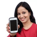 Young woman holding mobile phone Royalty Free Stock Photo