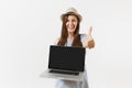 Young woman holding modern laptop pc computer with blank black empty screen to copy space isolated on white background Royalty Free Stock Photo