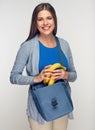 Young woman holding nosh in food bag