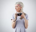 Young woman holding old film camera Royalty Free Stock Photo