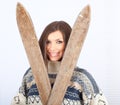 Young woman holding old wooden ski Royalty Free Stock Photo