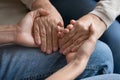 Young woman holding older mother hands, help and support Royalty Free Stock Photo