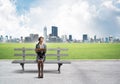 Young woman holding open book on wooden Royalty Free Stock Photo