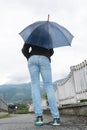 Young woman holding opened umbrella Royalty Free Stock Photo