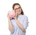 Young woman holding piggy bank on white background. Money savings concept Royalty Free Stock Photo